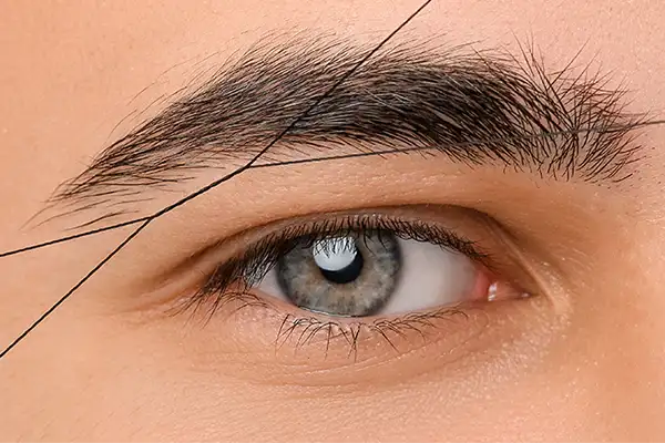 Eyebrow threading treatment at Elite Beauty Canterbury beauty salon.